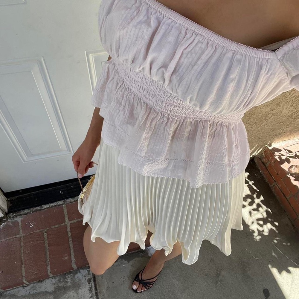 Ivory pleated mini skirt